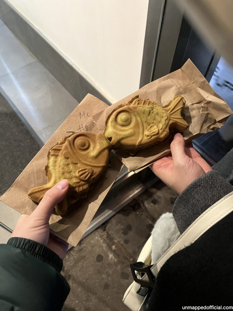 two fish shaped taiyaki desserts.