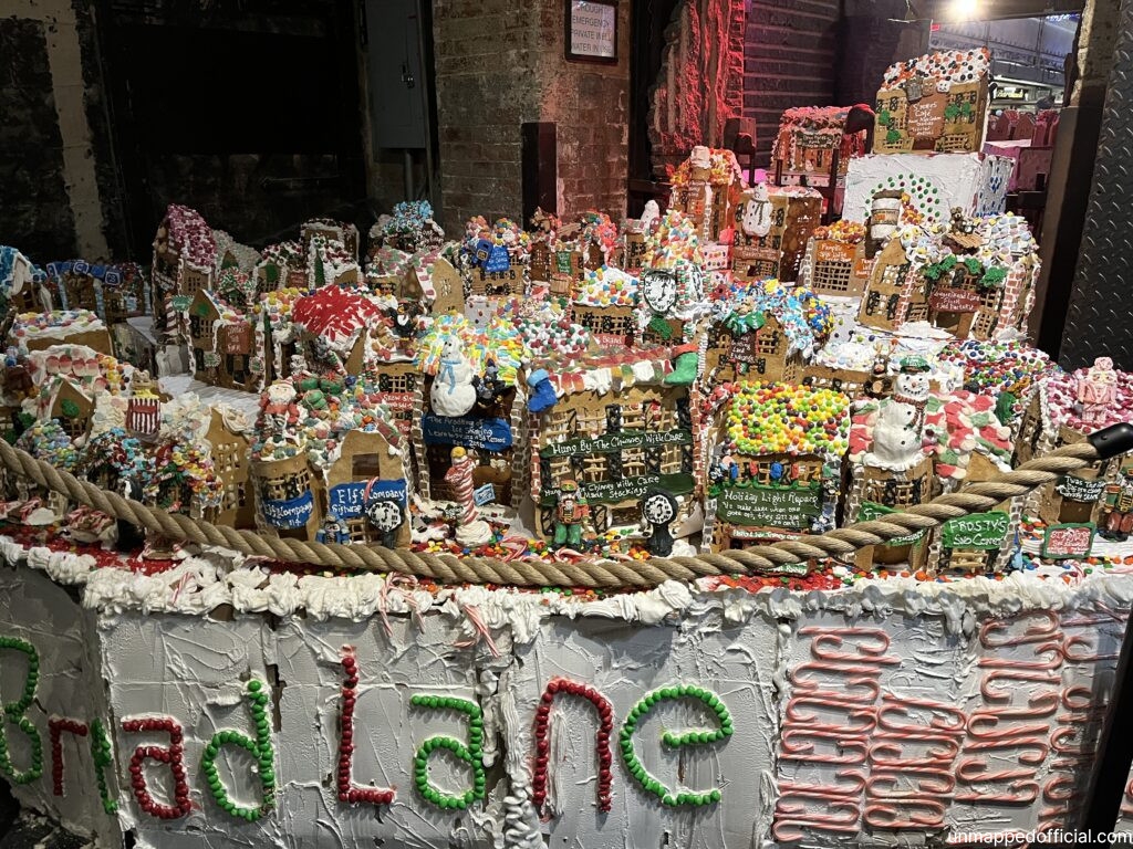 a large table covered with gingerbread houses
