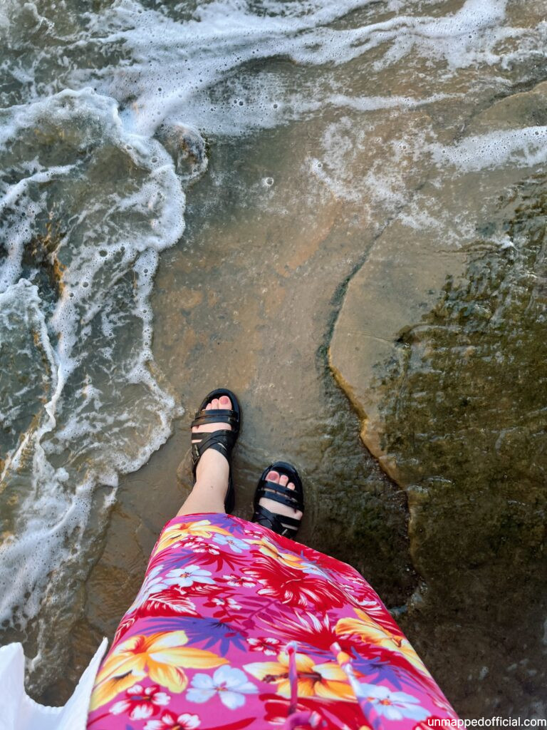 sunset cliffs cave in san diego showing cute skirt
