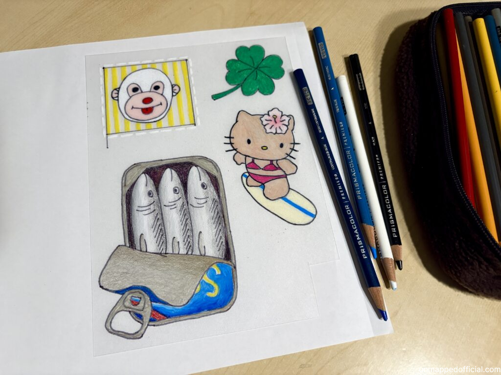 colored designs with color pencils on shrink plastic