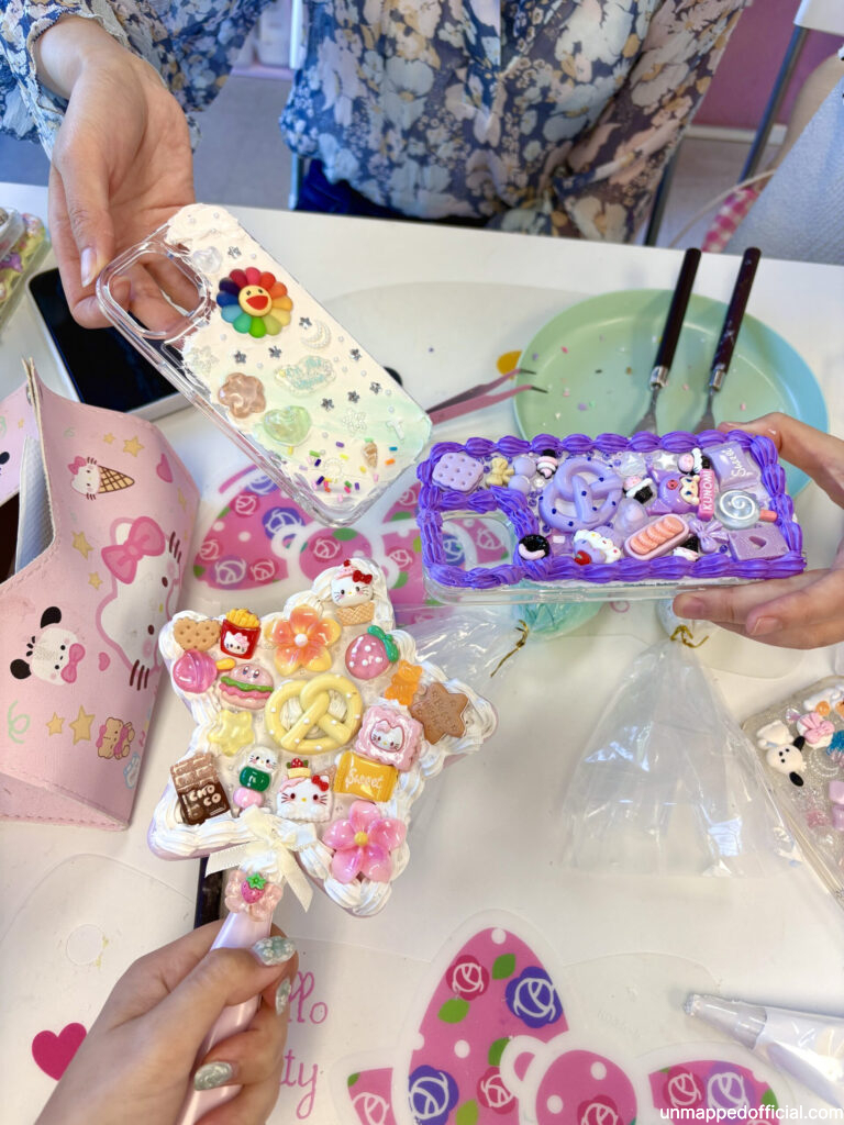 decoden phone cases and a decoden mirror completed craft workshop project
