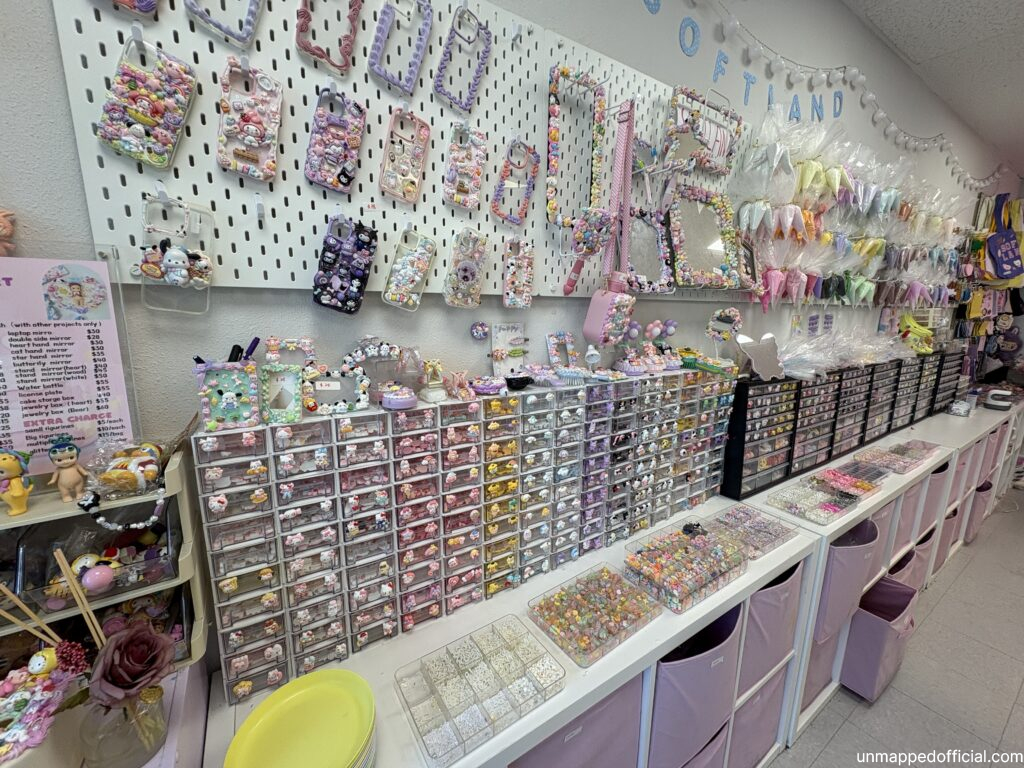 decoden charms organized in little drawers against the wall in Softland Studio