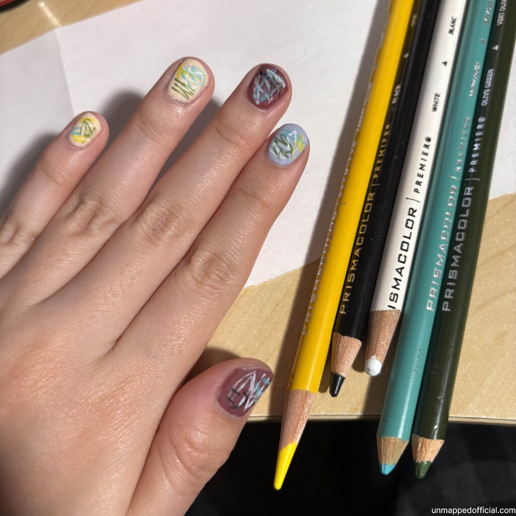 scribbled on nails with colored pencils. scribble nail design