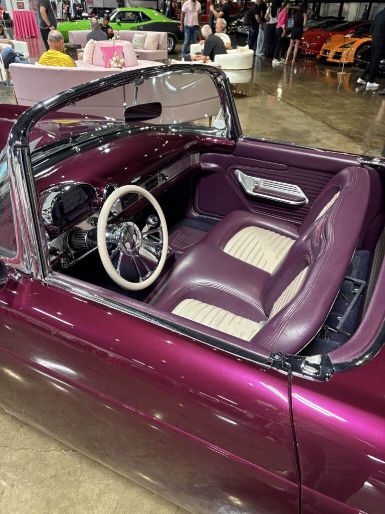 purple classic car at car show museum