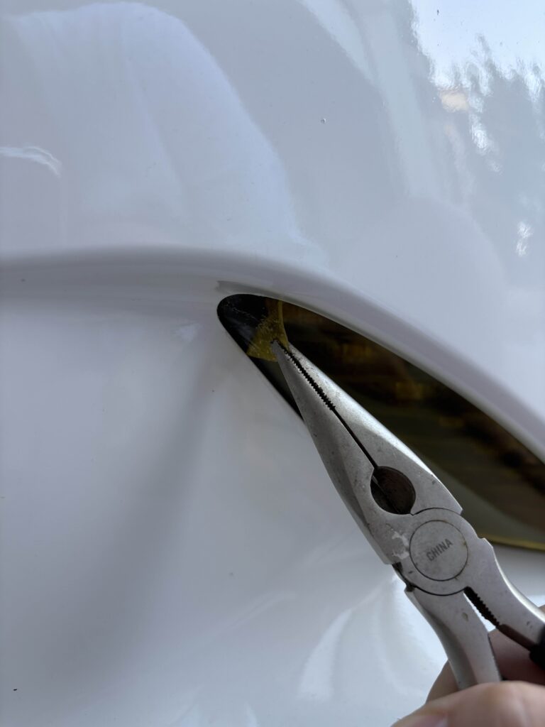 removing laminx film with tweezers